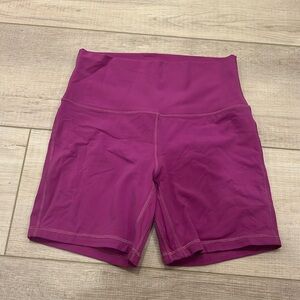 Pink Lululemon biker shorts